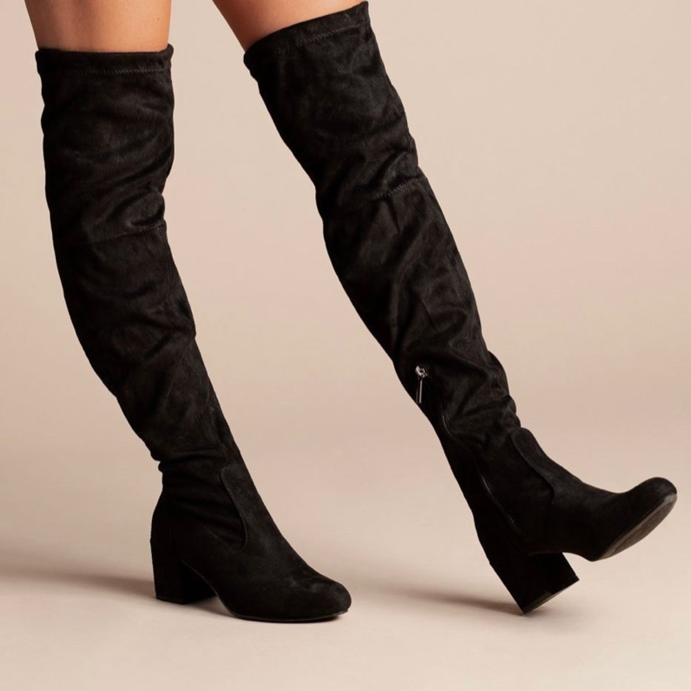 Black thigh high boots